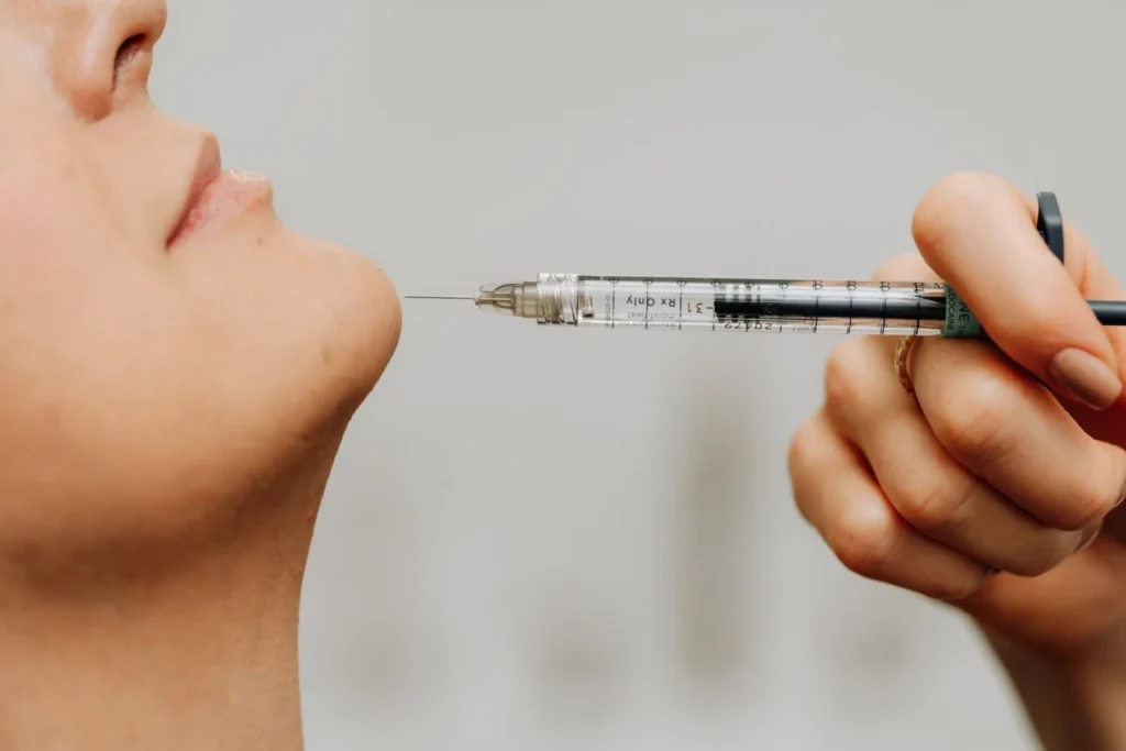 botox needle being injected into chin