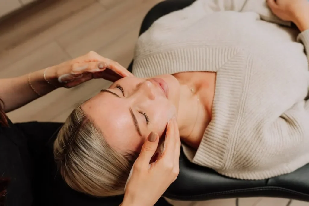 woman at medspa receiving a facial treatment