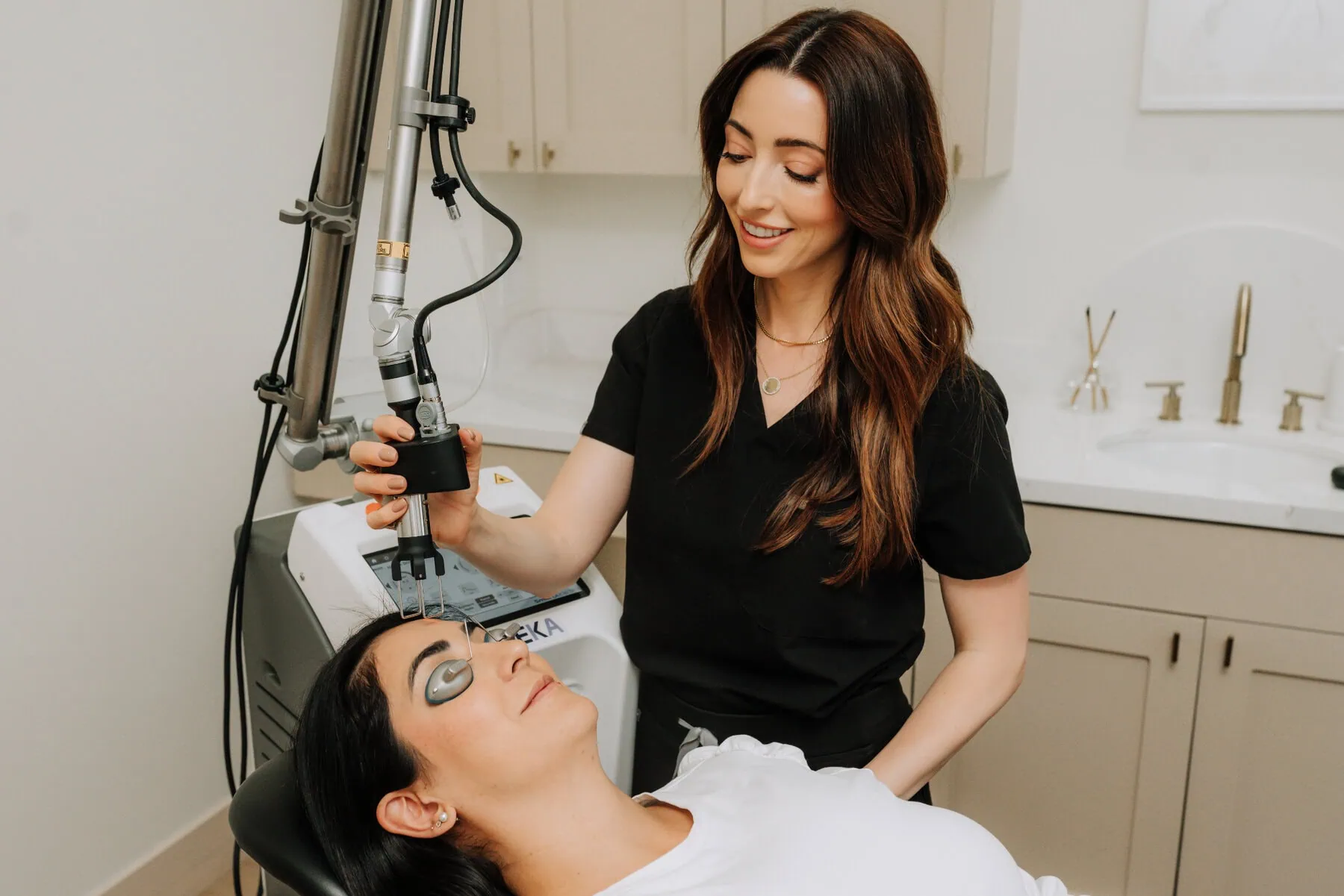 Katie from Curated Medical performing a CoolPeel laser treatment known for minimal downtime.