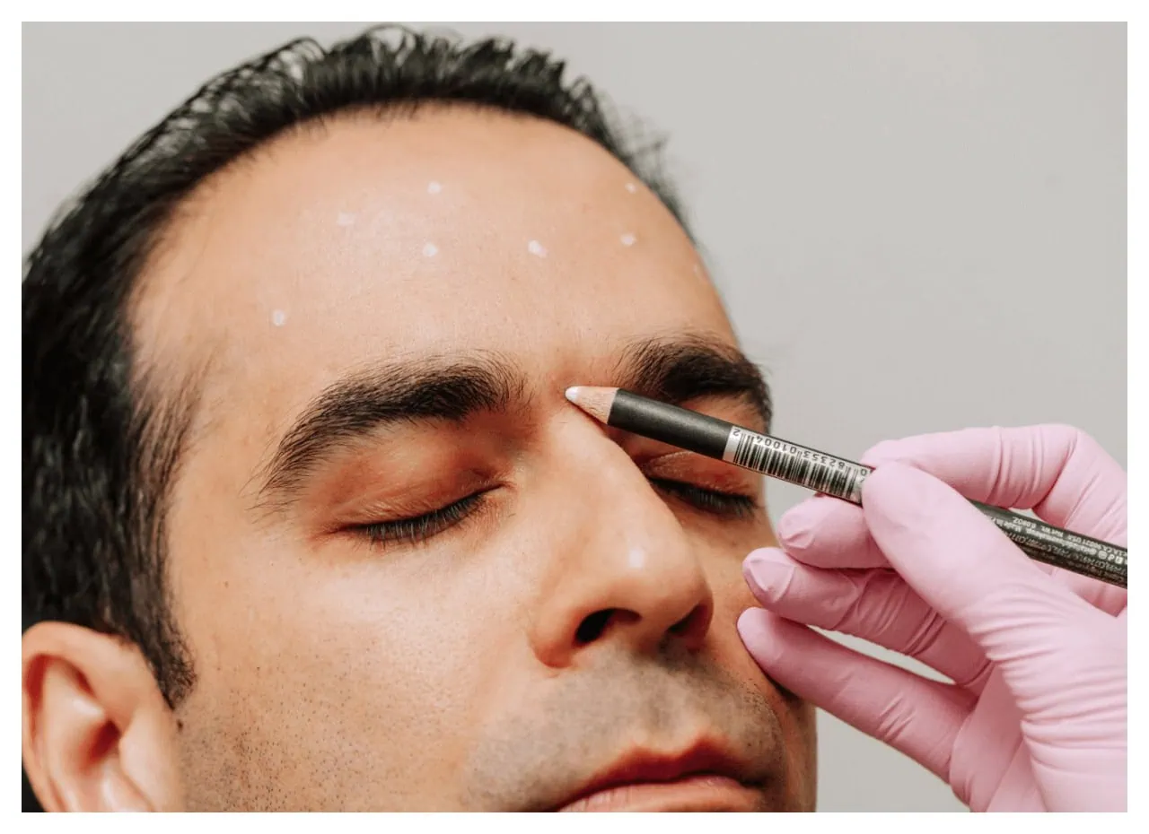 a man receiving a botox treatment at Curated Medical in Scottsdale